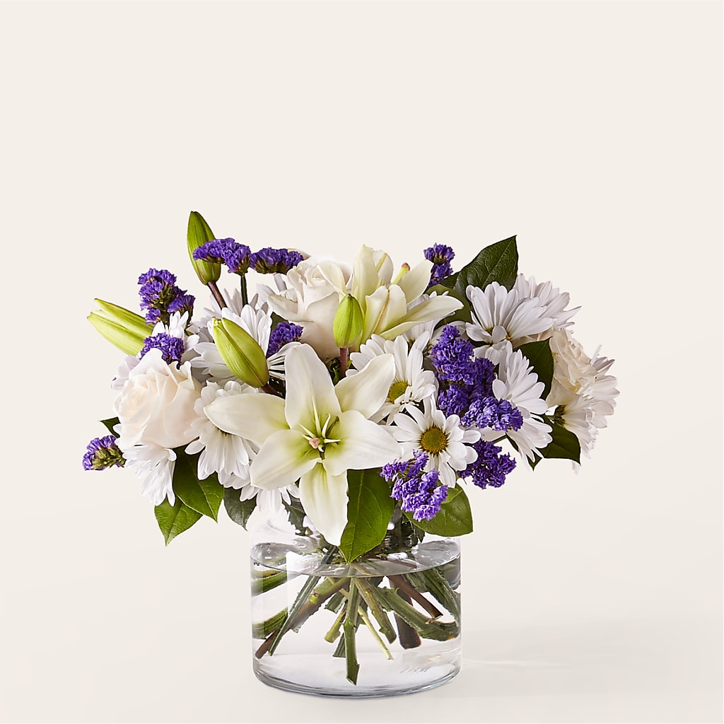 Beyond Blue Bouquet with White Roses Lilies and Daisies