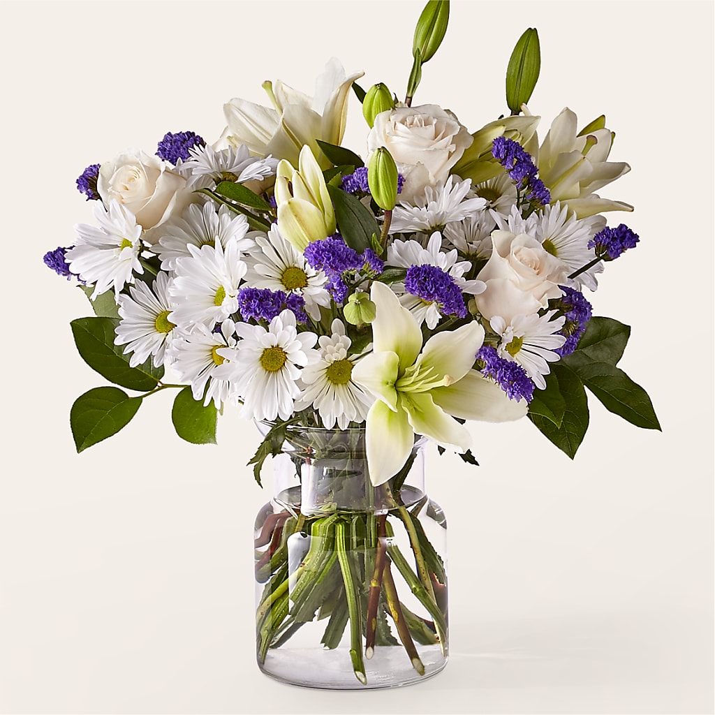 Beyond Blue Bouquet with White Roses Lilies and Daisies