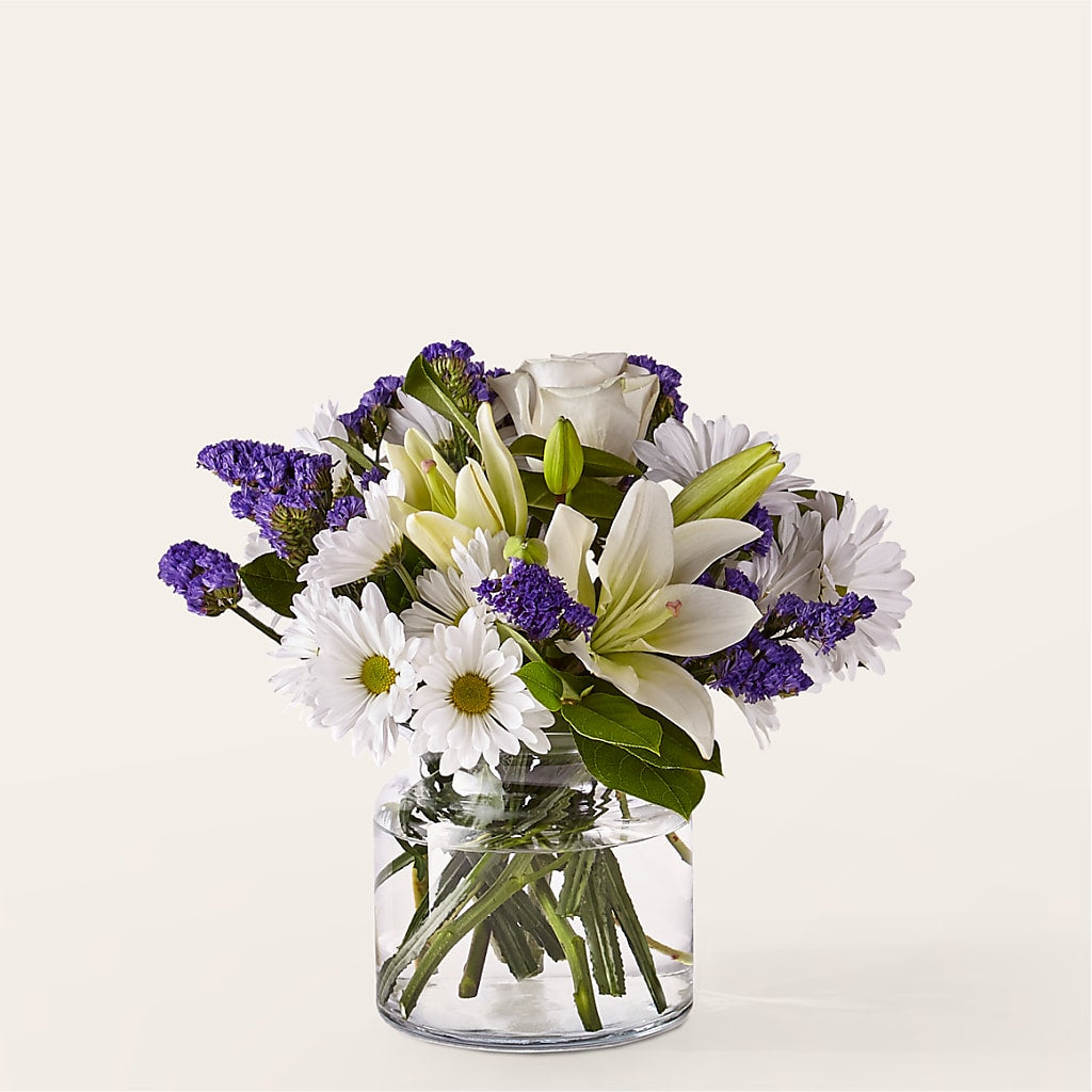 Beyond Blue Bouquet with White Roses Lilies and Daisies